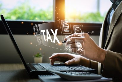 Tax deduction planning concept. Businessman calculating business balance prepare tax reduction. taxes paid by individuals and corporations such as VAT, income tax and property tax.