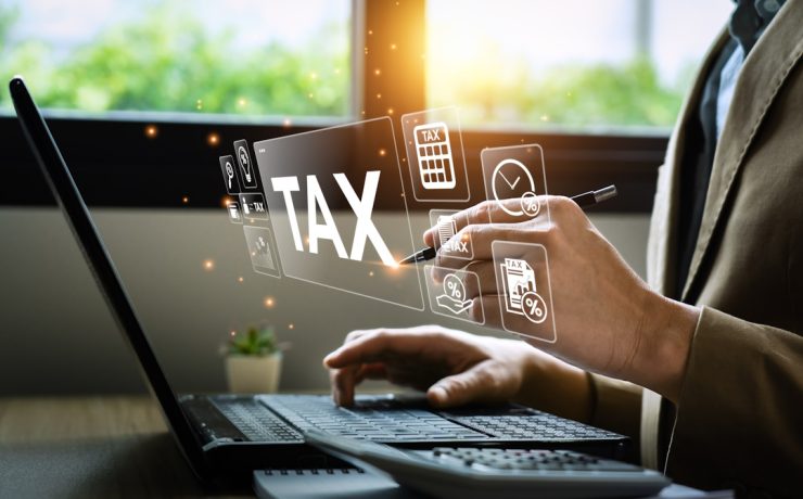 Tax deduction planning concept. Businessman calculating business balance prepare tax reduction. taxes paid by individuals and corporations such as VAT, income tax and property tax.